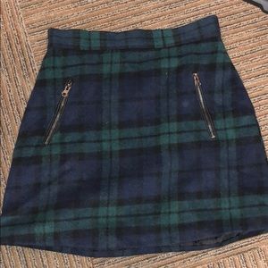 blue and green plaid mini skirt. fits small.